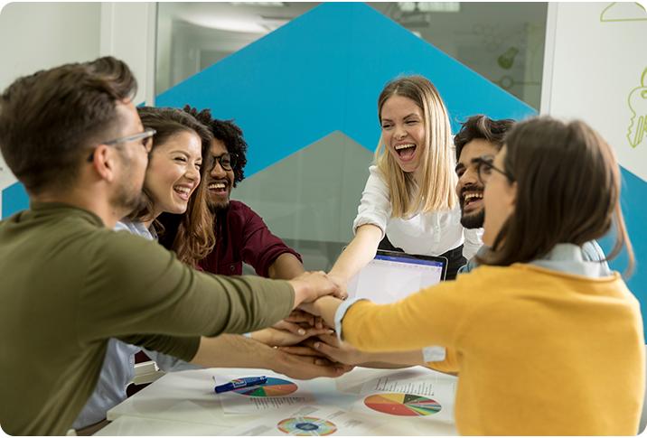 happy professionals collaborating because of superior HR support and bswift customer service excellence