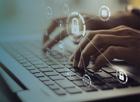 Hands on keyboard with security icons