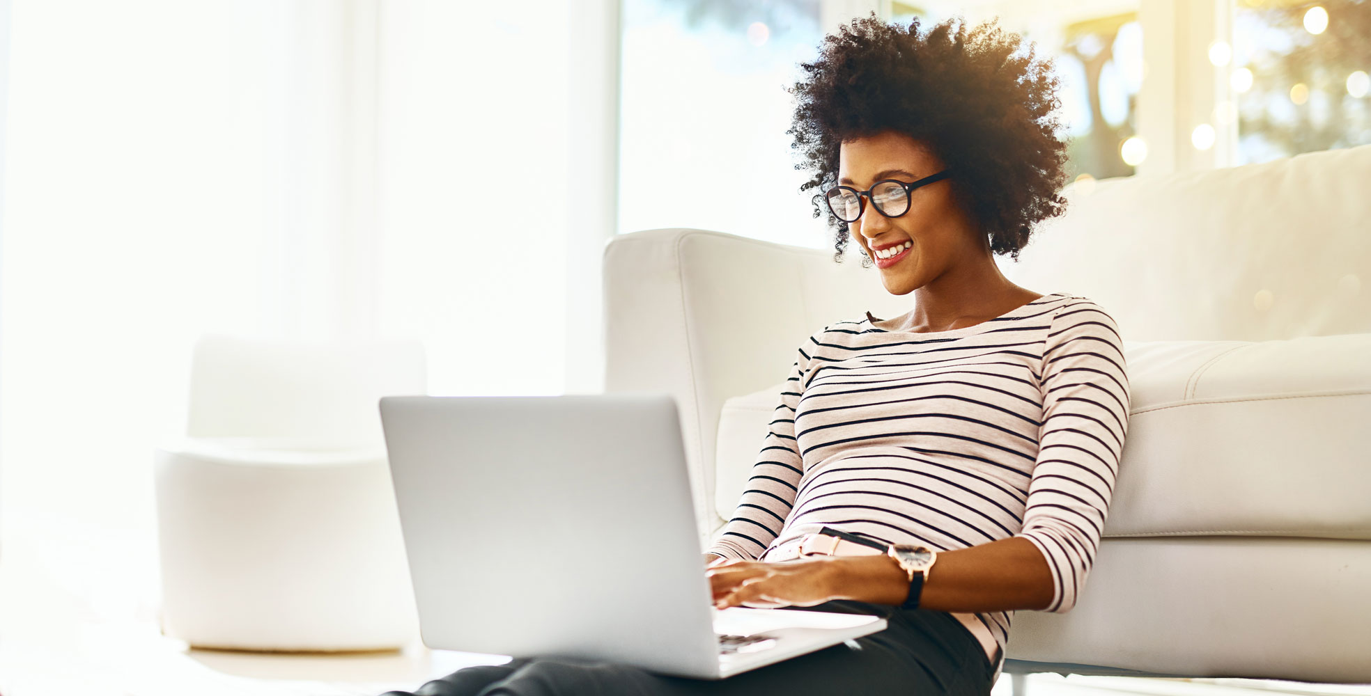 Woman typing on a laptop