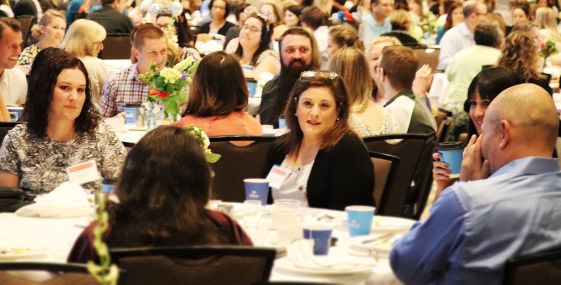 Idea Exchange attendees chatting at table