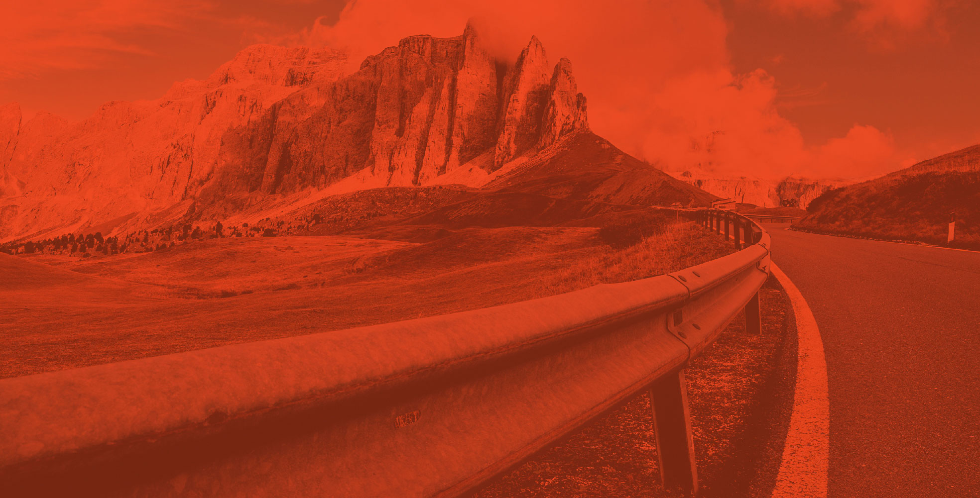 A road leading to a mountain