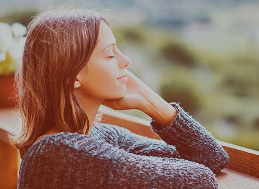 Woman relaxing outdoors