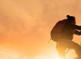 Person climbing a mountain