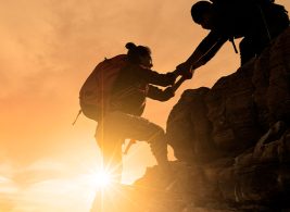 Person climbing a mountain