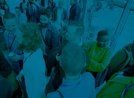 Conference attendees having conversations