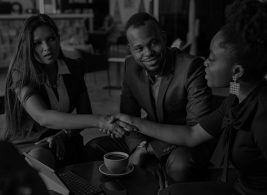 Co-workers interacting in the workplace
