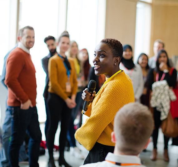People engaging at conference